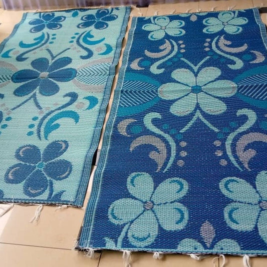 Tapis plastique africain bleu Mestissés